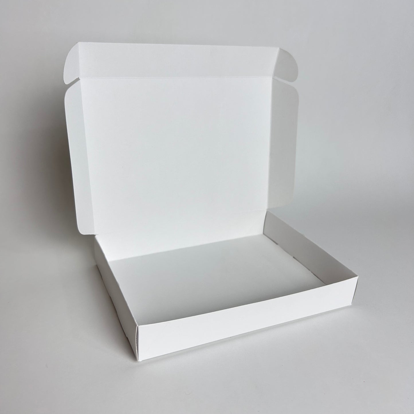 Caja 6 alfajores 19x14x3 cm Cartulina Blanca x100 unds.