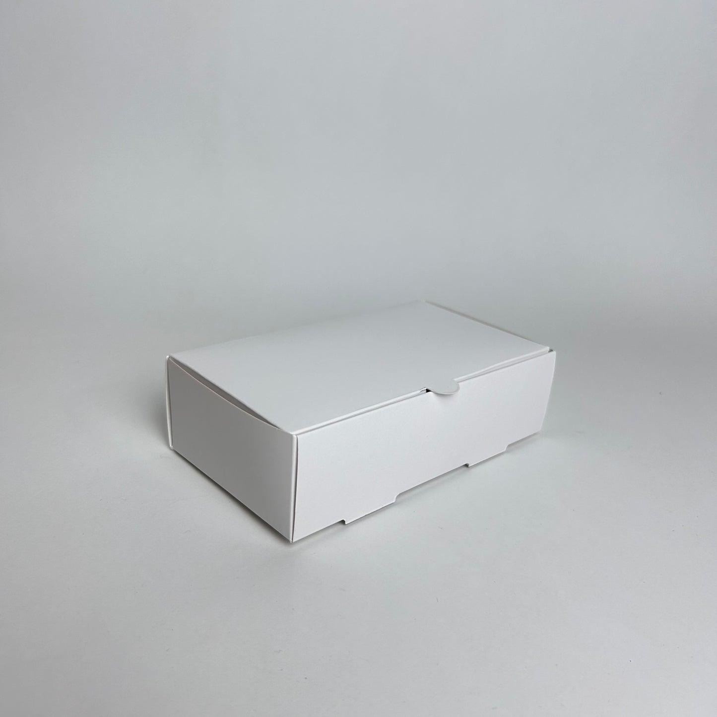 Caja 14x8x4 cm Cartulina Blanca x100 unds.